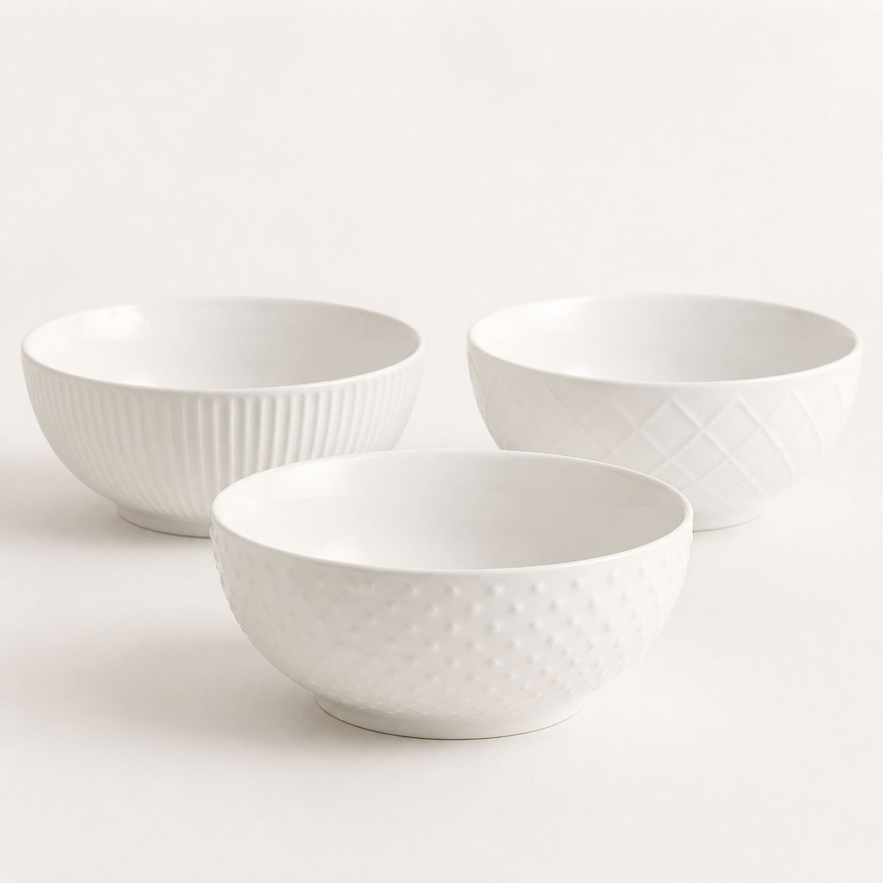 Trudeau three-piece white porcelain serving bowl set